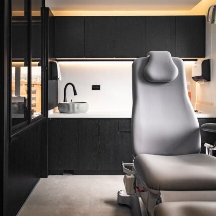 Sleek and modern dental office interior with stylish decor and ergonomic dental chair.
