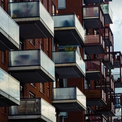 Distinctive balconies on modern apartment buildings in Amsterdam.